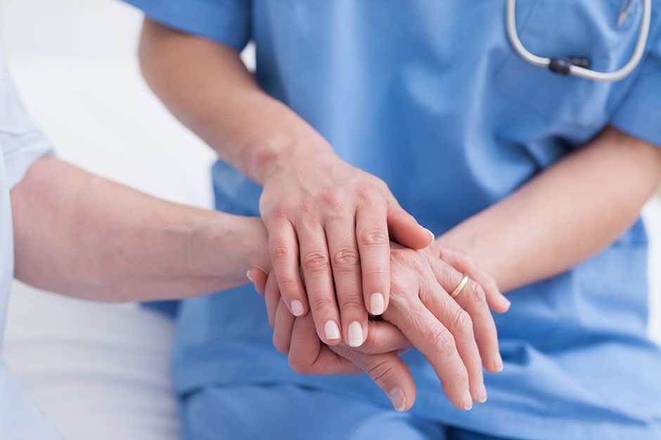 How Can Nurses Improve Patient Satisfaction? Nurse Holding Patient's Hand